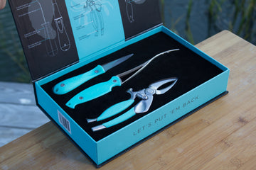 Oyster knife, shrimp deveiner and crab cutter in display box 