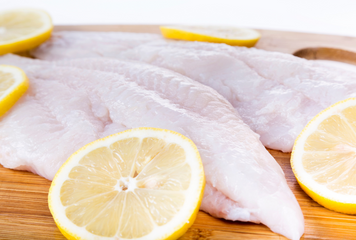raw catfish fillets with lemons  